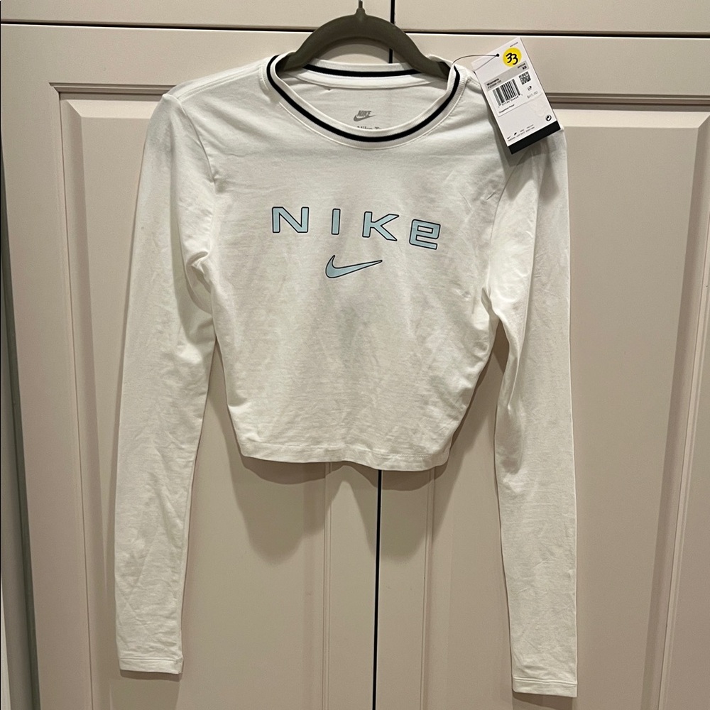 Nike Women's White Long Sleeve Tee with Black Trim the Nike tee slim fit